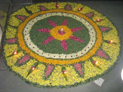 exquisite flower rangoli patterns on the floor of Rotary Library